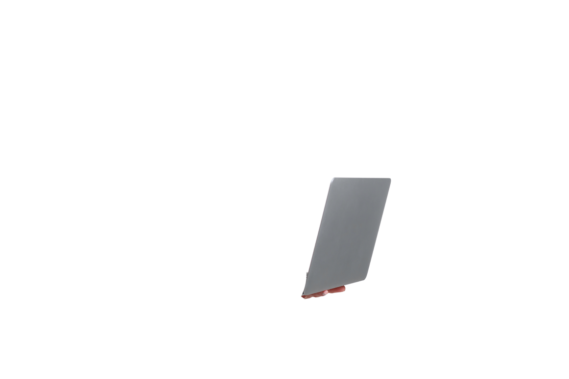 Happy woman holding personal computer posing on camera